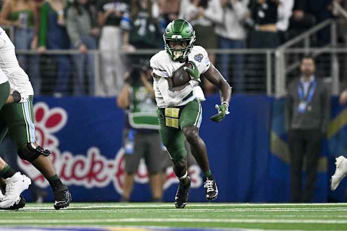Jan 2, 2023; Arlington, Texas, USA; Tulane Green Wave running back Tyjae Spears (22) in action during the game between the USC Trojans and the Tulane Green Wave in the 2023 Cotton Bowl at AT&T Stadium. Mandatory Credit: Jerome Miron-USA TODAY Sports